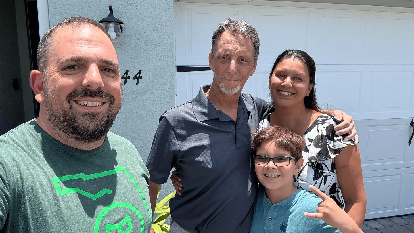 Team John Garuti with a just-sold sign at Babcock Ranch®